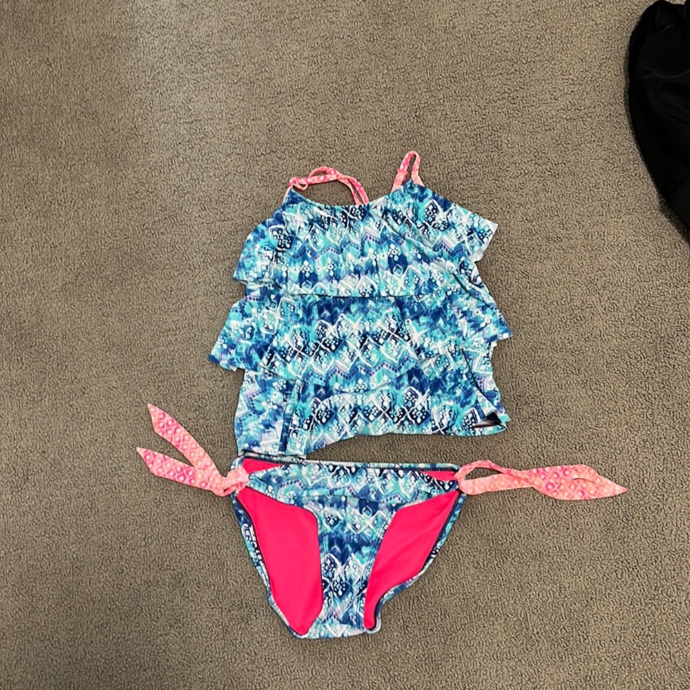 Blue,white, and pink swimsuit.